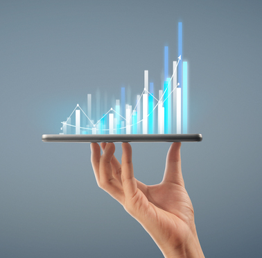 Businessman plan graph growth and increase of chart positive indicators in his business,tablet in hand